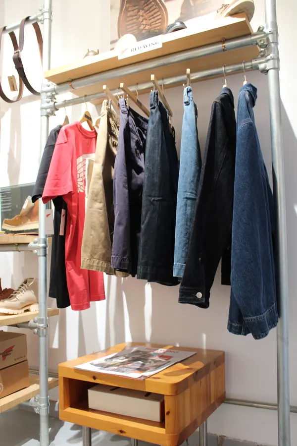 Apparel rail with denim and outerwear in our Madrid showroom